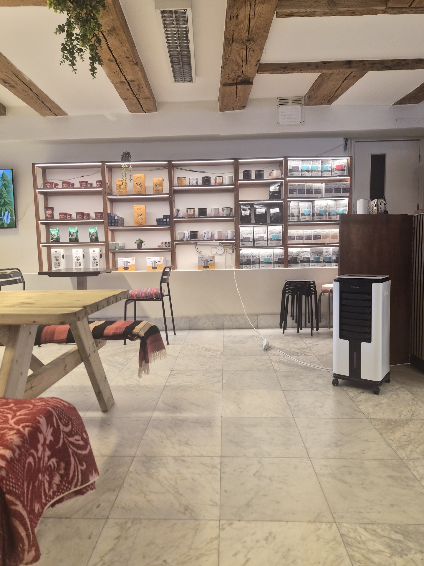 Retail shelves of Greek coffee and briki sets